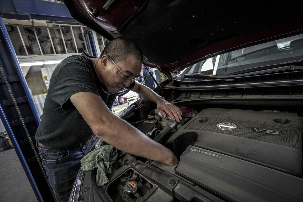 Mechanic working at customer driveway